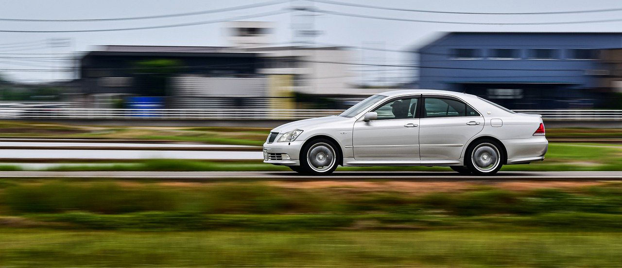 Car driving along a road